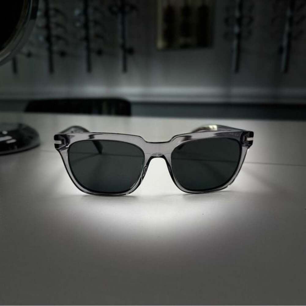 Stylish Prada translucent grey poalarized sunglasses